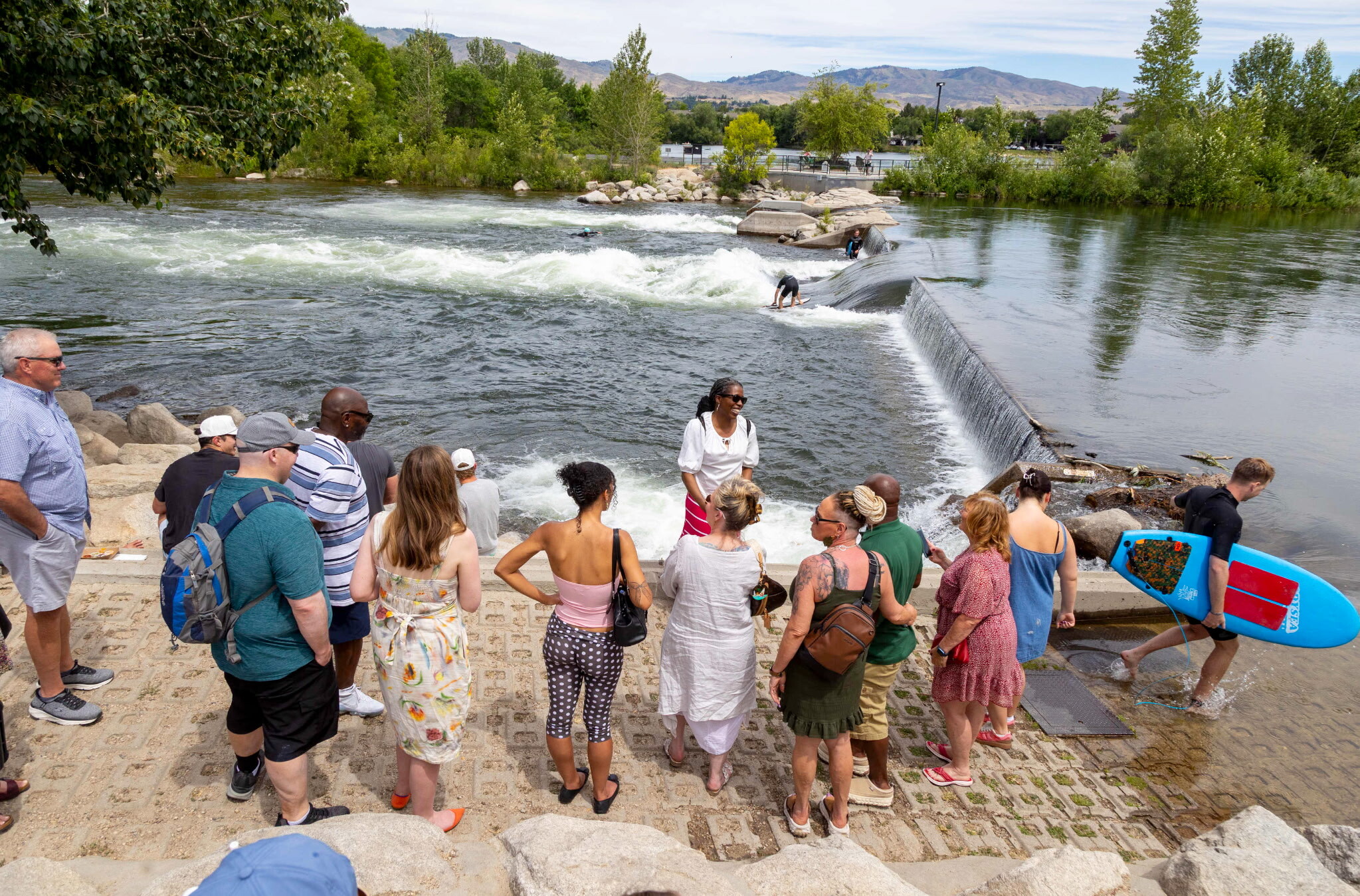 Indulge Boise Food Tours Tour Guide introduces tour guests to Whitewater Park during The Boise River Urban Wine Trail Tour.